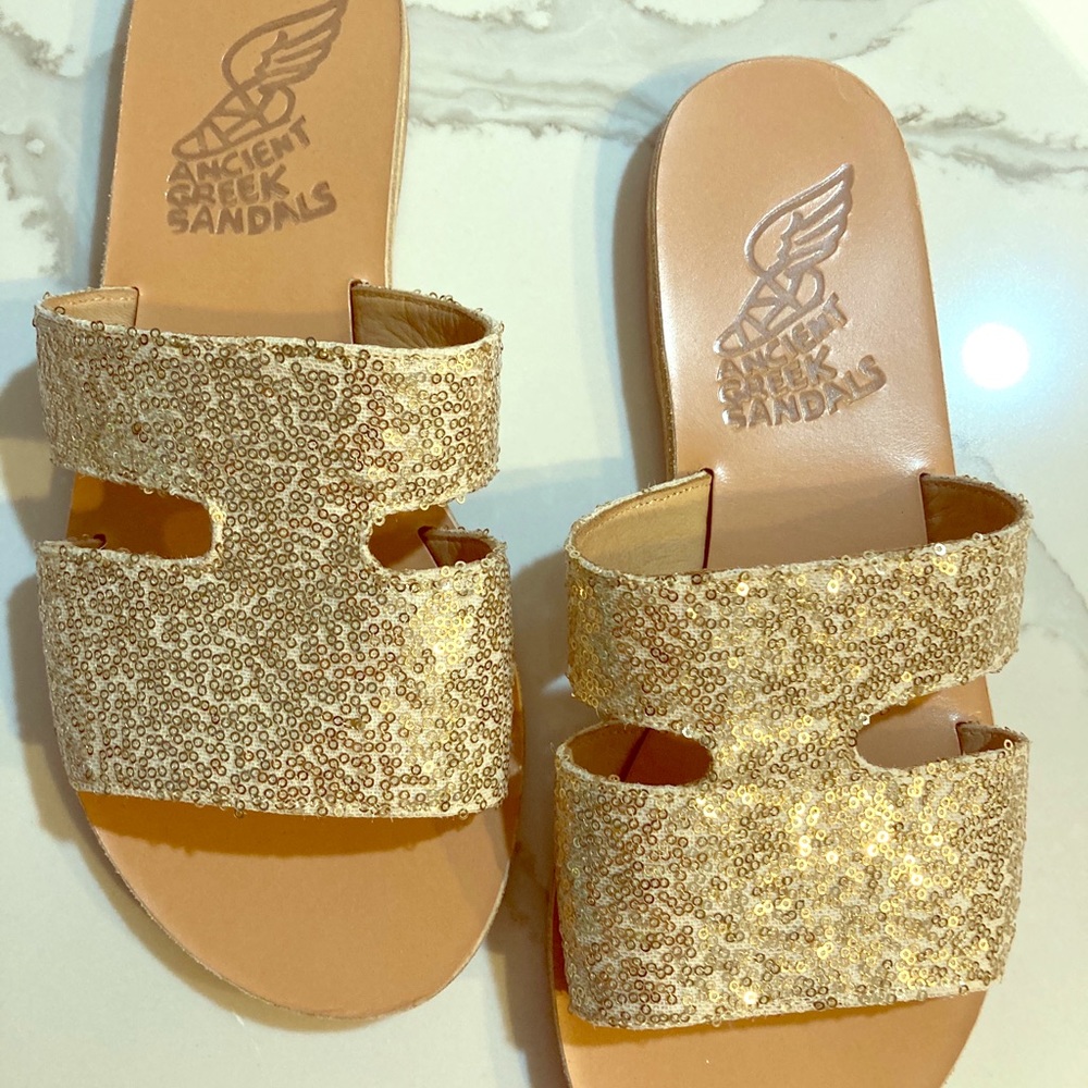 ANCIENT GREEK SANDALS. “Apteros” w/ gold sequins.